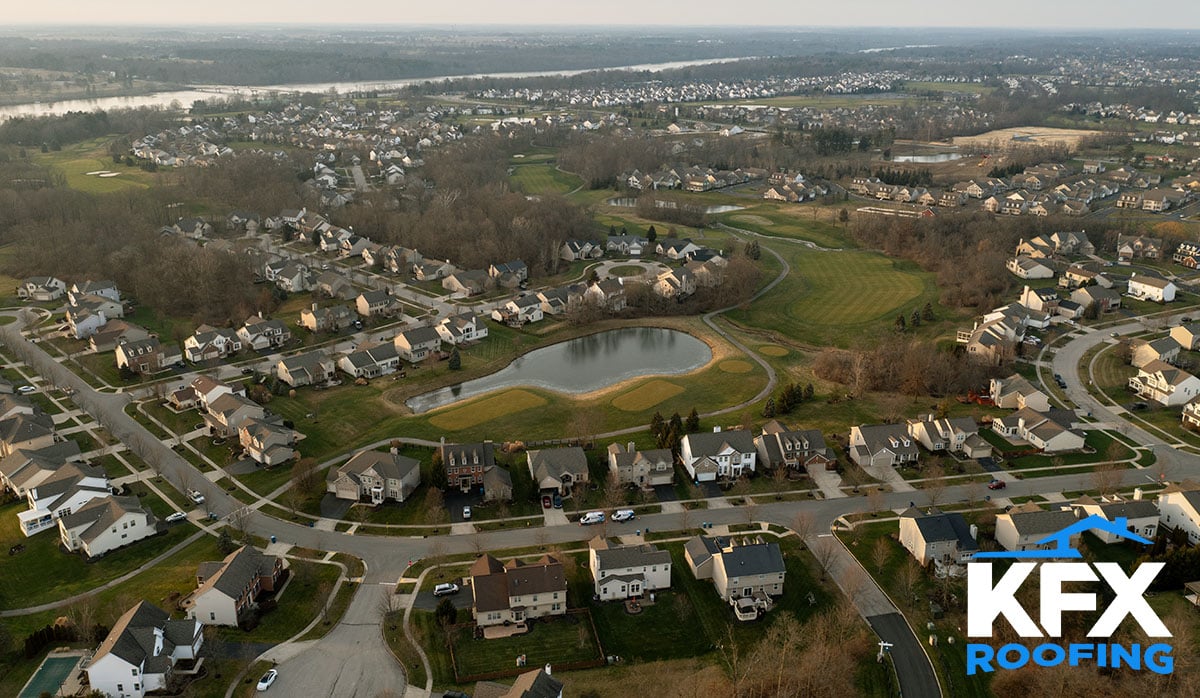 Scenic Olentangy River with beautiful homes requiring expert roofing services in Delaware OH