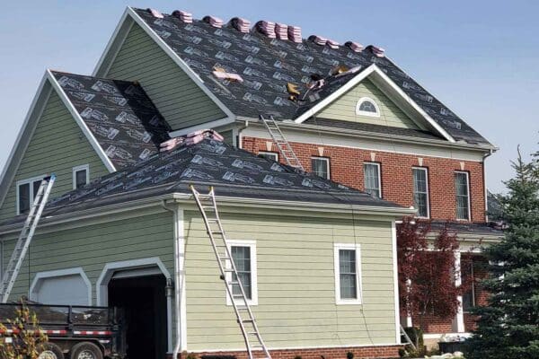 Our crews take a break during a residential Roof replacement with Owens Corning Duration shingles