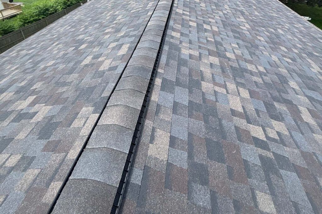 Final inspection photo of a residential roof replacement