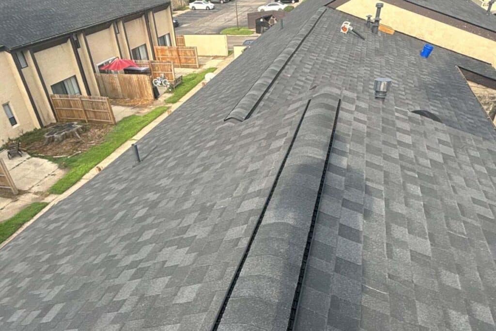 We took photos after the final inspection, showing the completed multi-family roof.